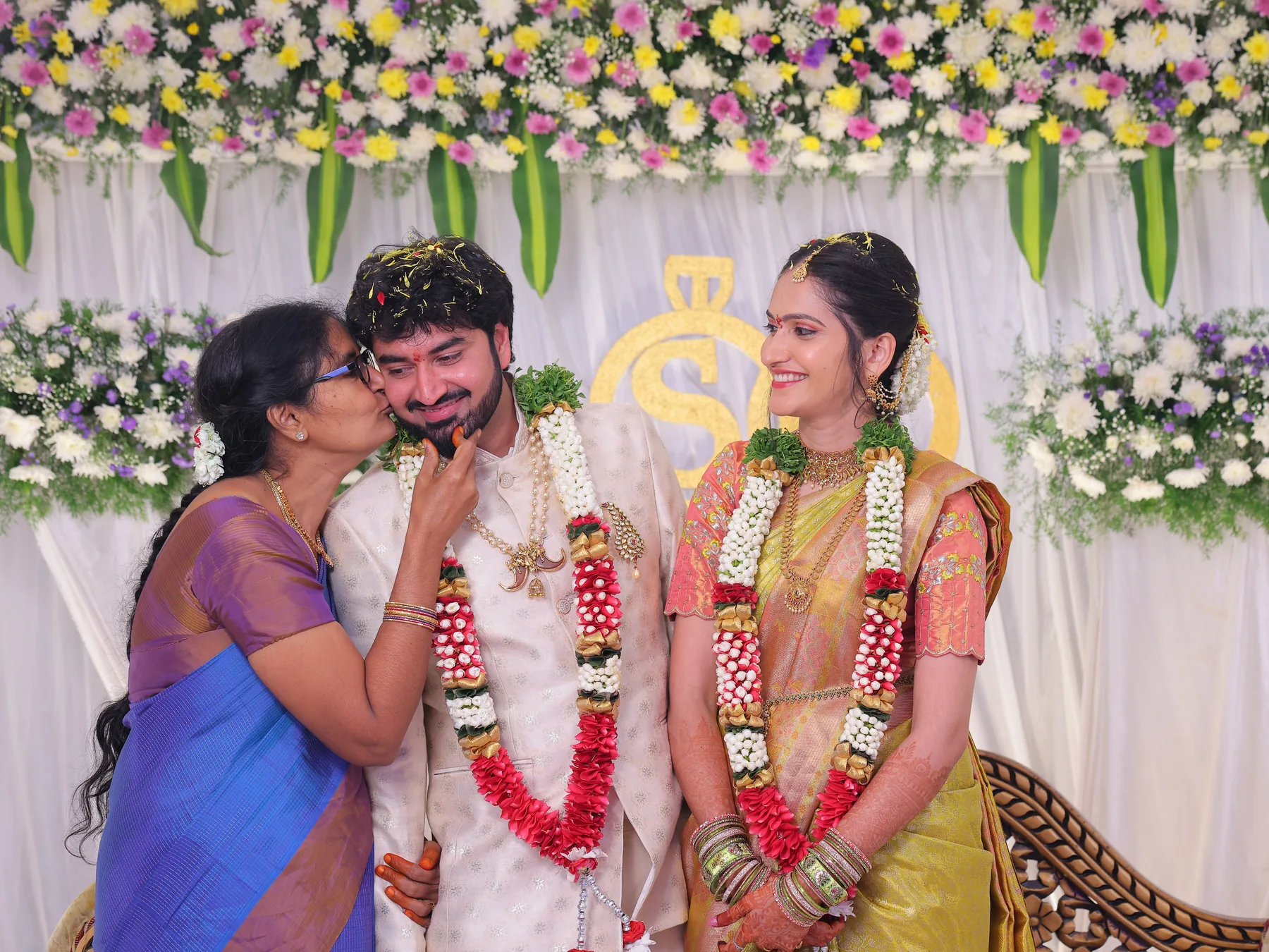 A loving kiss from Mum during the engagement